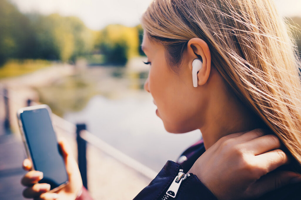 person with wireless earphones