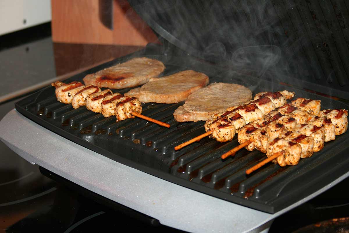 piastra per panini fettine di carne e spiedini alla grill